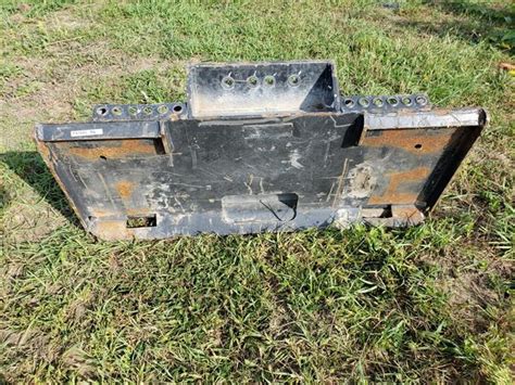 bob-tach vs universal skid steer mounting plate|bobcat universal quick attach.